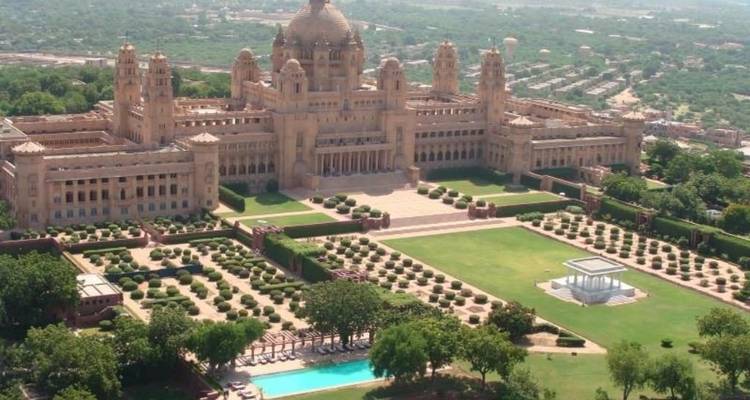 Umaid Bhawan Palace with surrounding gardens from above.