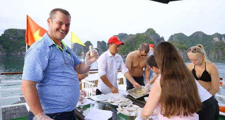 People participating in a cooking activity on a boat.