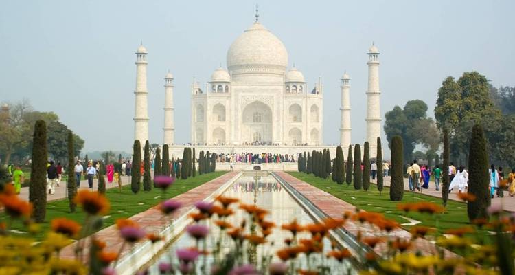 Taj Mahal with flowers in the foreground.