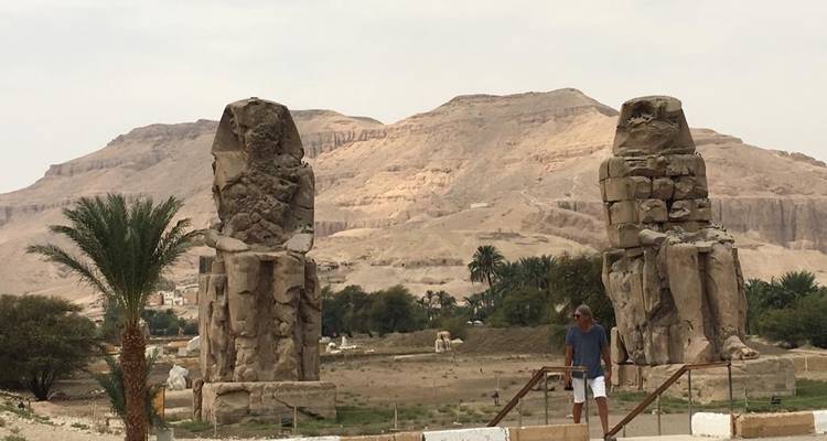 Tourists near the Colossi of Memnon statues.
