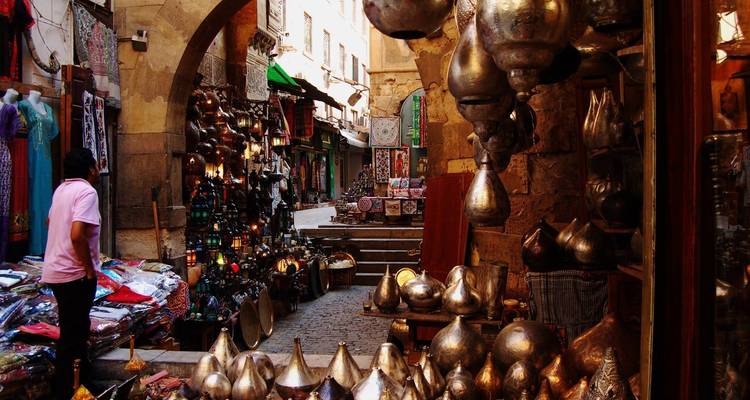 Market street with metallic lamps and decorations