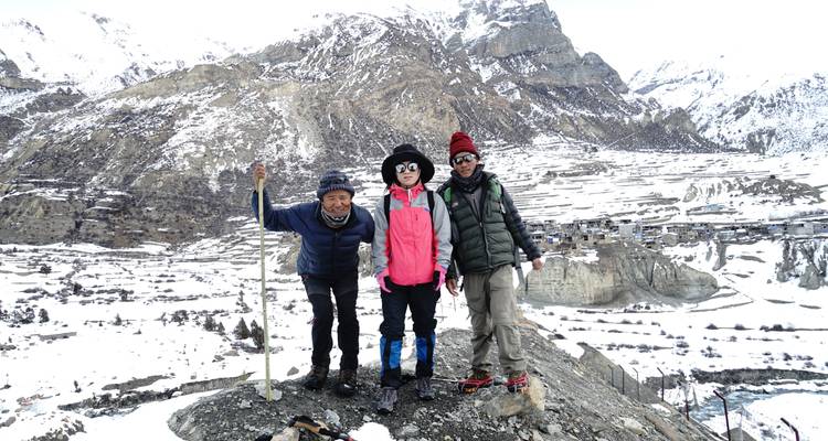 Group of hikers in snowy mountains