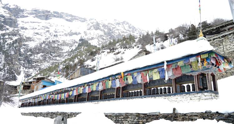 Prayer flags in a snowy village