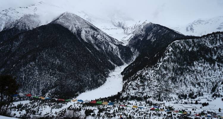 Snow-capped mountain with valley