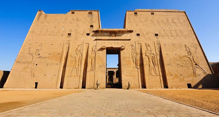 Facade of the Temple of Edfu in Egypt with hieroglyphics.