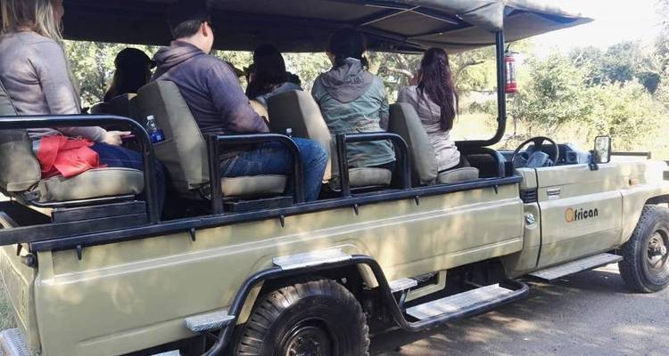 Game drive, Rhino tracking,Village tour, Reptile park,Victoria falls/ Botswana day safari. - African joined tours and safaris