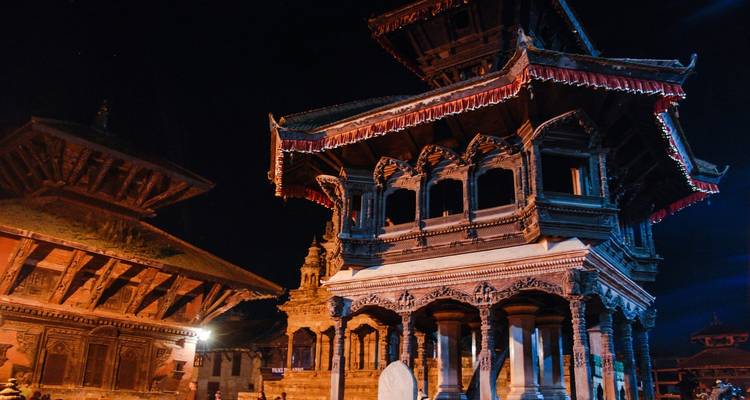 Traditional Nepalese building at night.