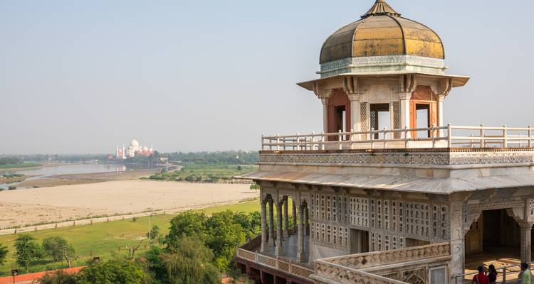Rooftop view towards a distant iconic monument.