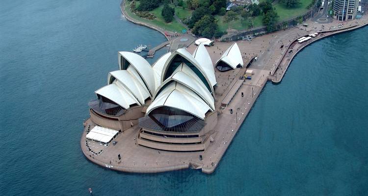 Aerial view of a famous opera house on the harbor.