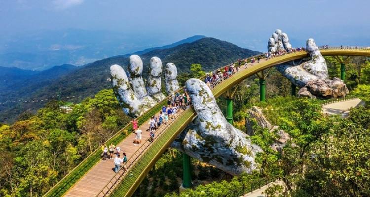 Golden Bridge held by giant hands on a sunny day.