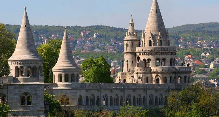 Fairytale turrets of Fisherman’s Bastion overlooking the leafy Buda hills and cityscape.