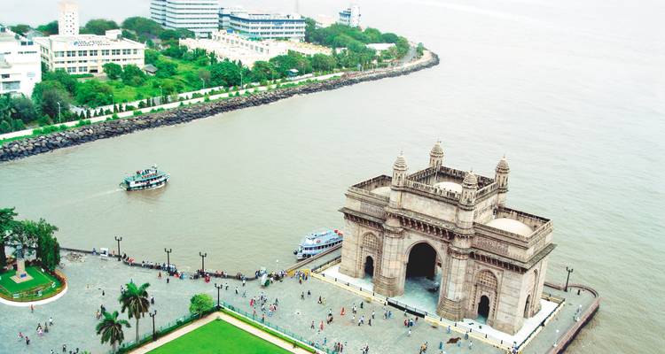 Aerial view of the Gateway of India at the waterfront.