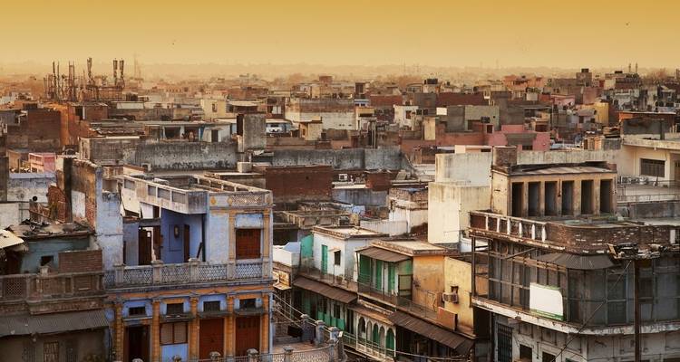 Dense cityscape with a golden hue