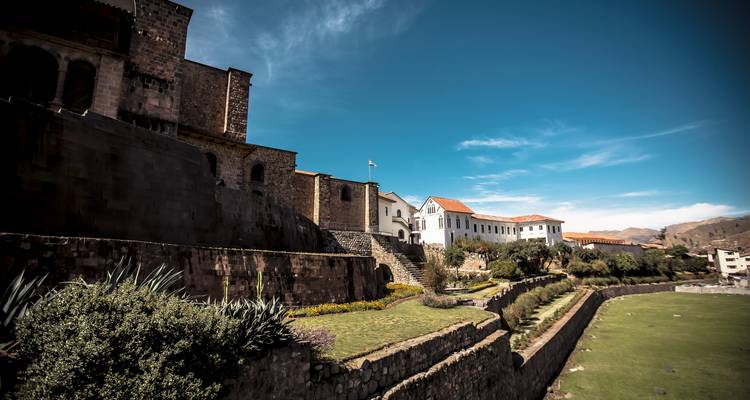Modern and ancient buildings on a hillside.