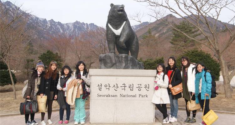 Group posing in front of Seoraksan National Park sign.
