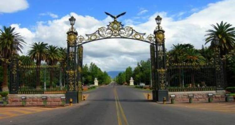 Decorative iron gates at a city entrance.
