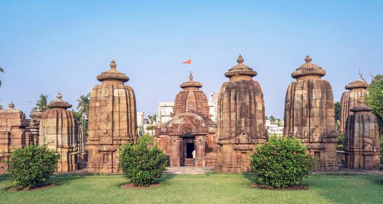 Mukteshvara Temple surrounded by greenery.