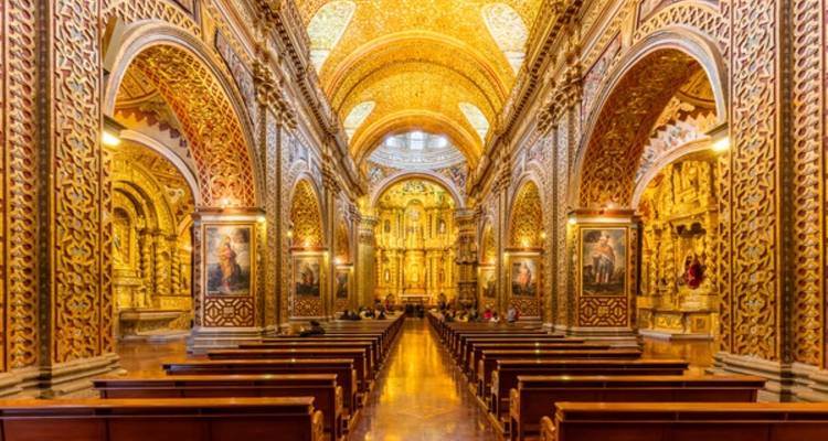 Elaborate interior of a richly decorated church.