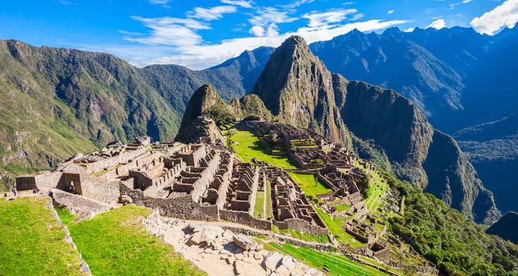 Machu Picchu ruins with a scenic mountain backdrop.