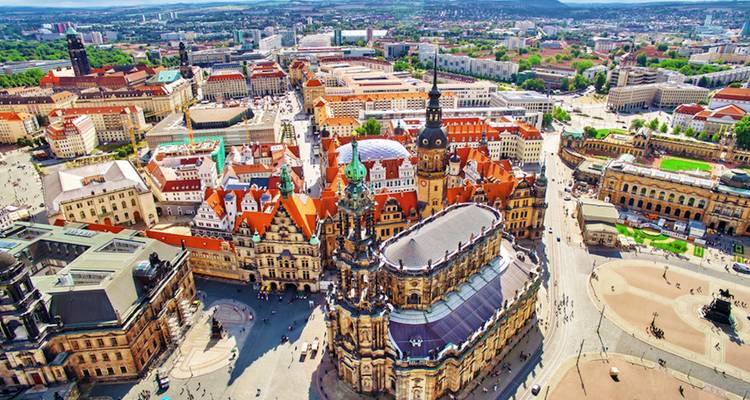 Aerial view of a historic European city with ornate architecture.