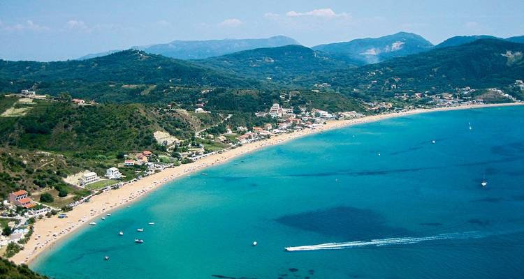 Aerial view of a long beach with turquoise water