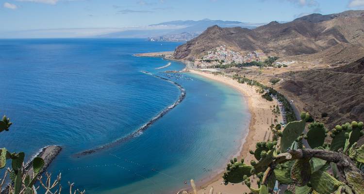 Stunning coastline with cliffs and sandy beach.