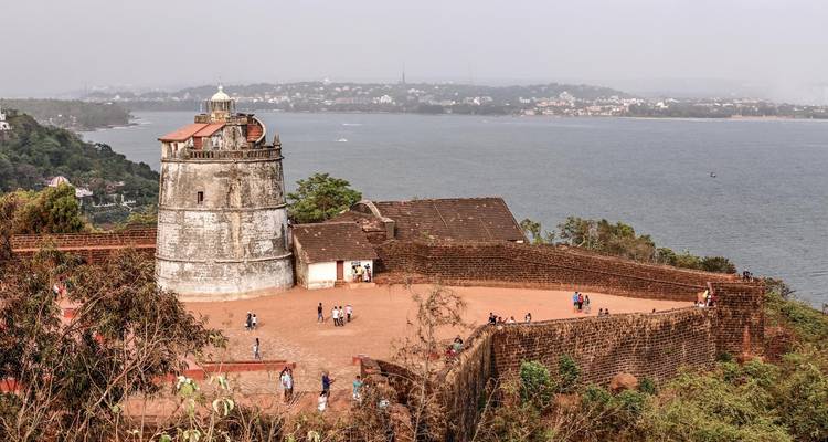 Fortified lighthouse with a view of the sea.