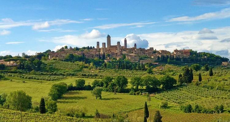 Panorama of a historic hilltop town with a clear blue sky.