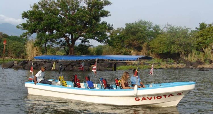 People on a boat tour on a river.