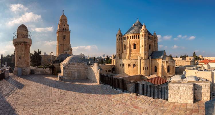 Panoramic view of a historic area with domed buildings and towers.