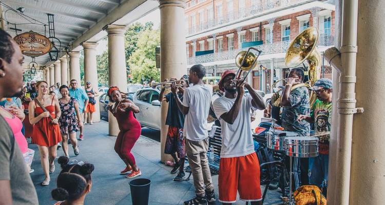 Street musicians performing for a crowd.