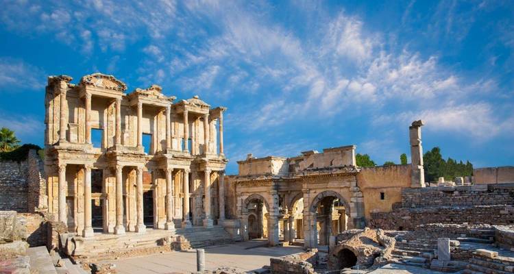 Ephesus ancient ruins with a clear blue sky.