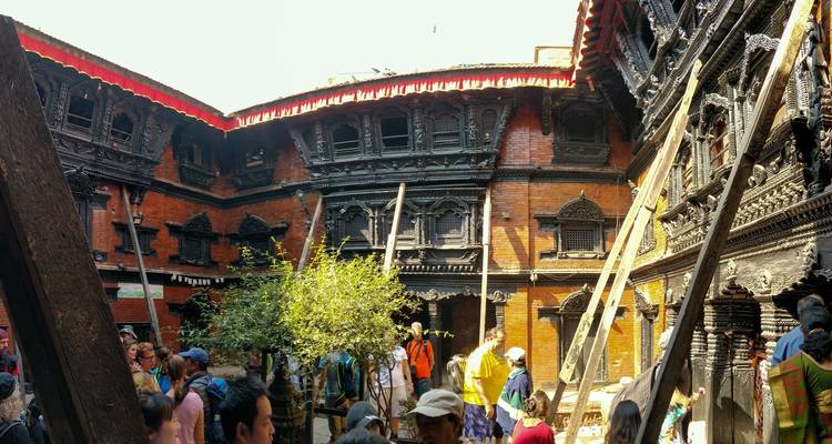 Interior courtyard with traditional architectural features and tourists.