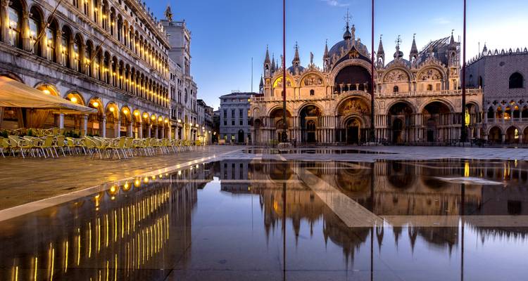 Reflection of St. Mark's Basilica in Venice at dawn.