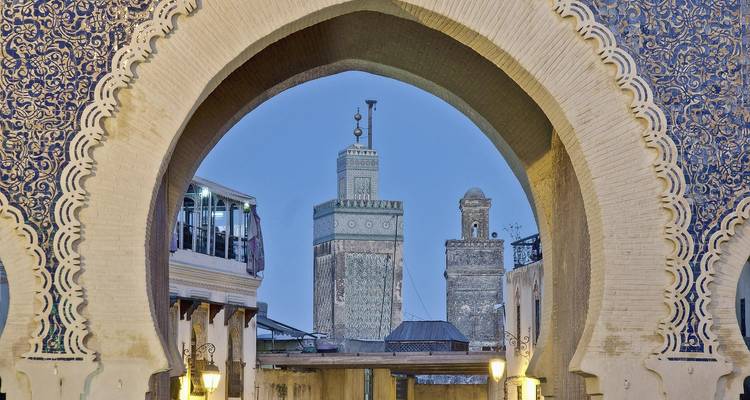 Intricate architectural archway with mosaic details.