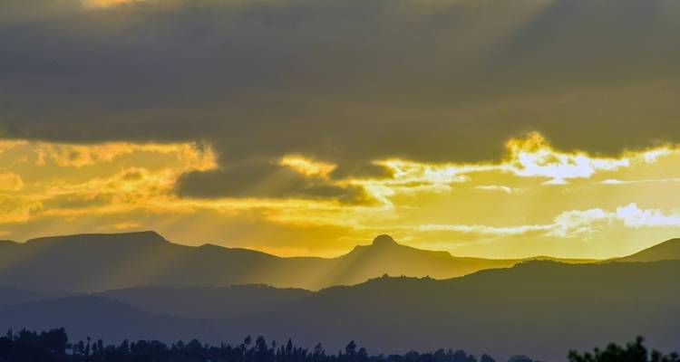 Sunset over a mountainous landscape