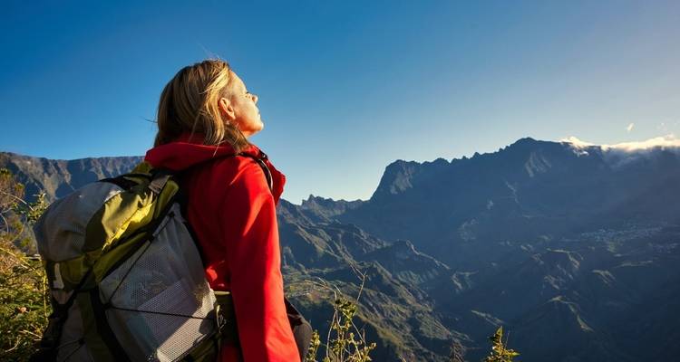 Hiker admiring mountain views.