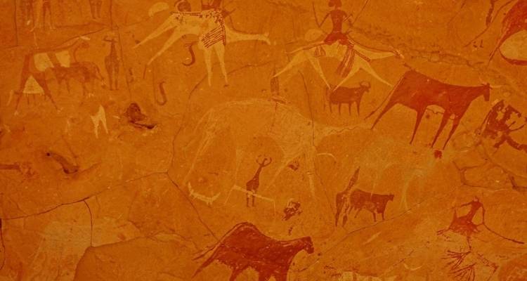 Ancient rock paintings depicting animals and people.