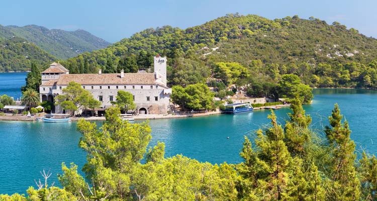 Benedictine monastery on a tiny island in Mljet’s turquoise lake.