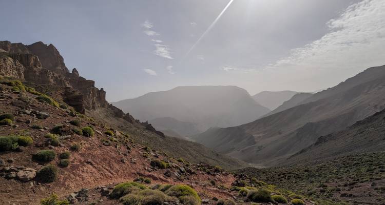 Hazy mountains in a desert landscape.