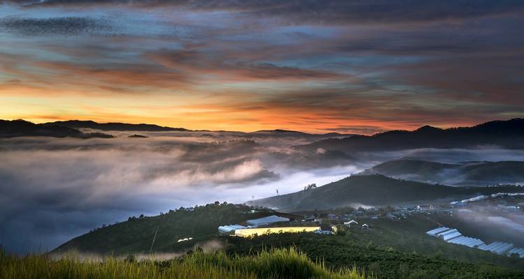 Misty mountains and dawn over Dalat