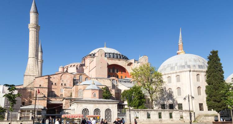 Exterior of Hagia Sophia with people in the foreground.