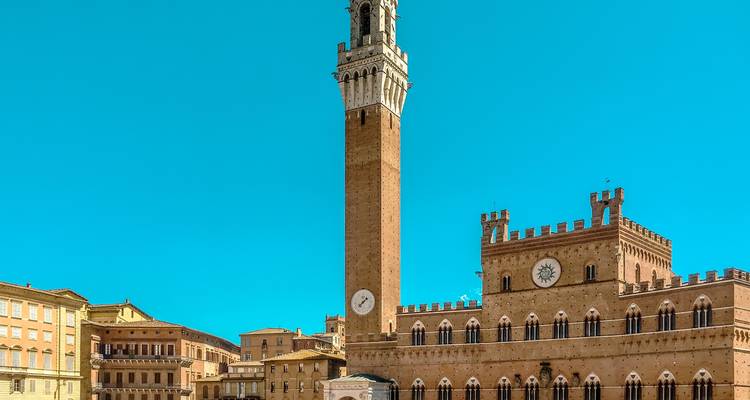 Piazza del Campo with Torre del Mangia in Siena, Italy.