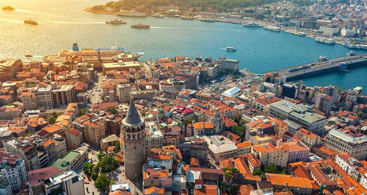 Aerial view of Istanbul with a prominent tower and waterways.