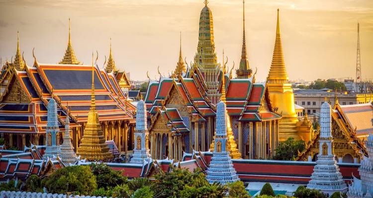 Ornate Buddhist temple complex with golden spires.