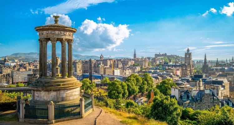 Panoramic view over Edinburgh from Calton Hill with the Dugald Stewart Monument in foreground