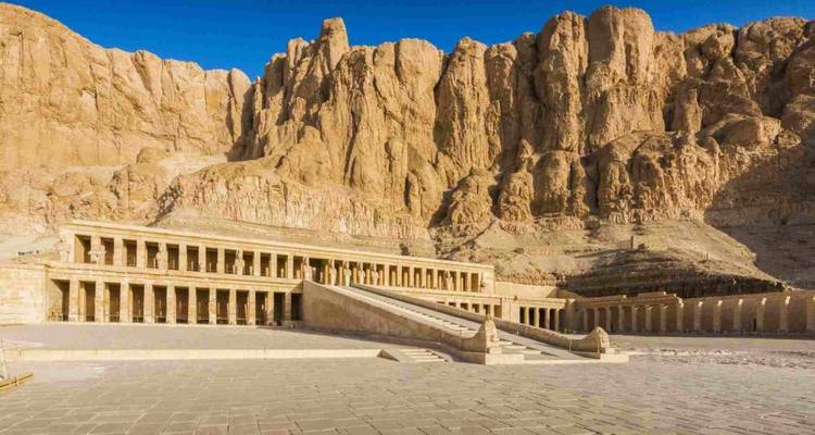Ancient temple against a backdrop of rocky hills.