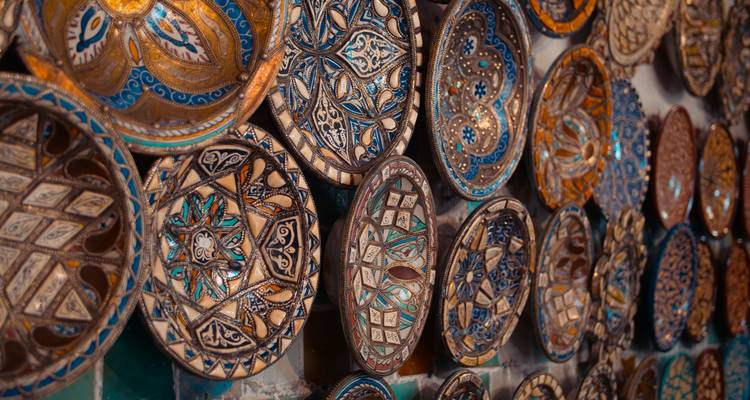 Artistic ceramic plates on display in Morocco.