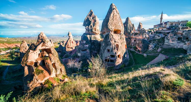 Rock formations with cave dwellings in Cappadocia.