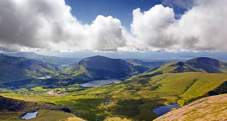 Vast landscape view from a mountain with lakes.